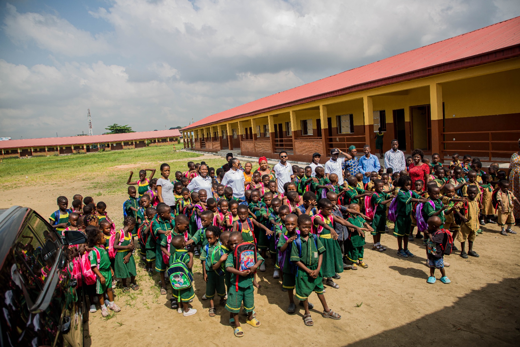 Pupils receiving school bags and supplies during the Ilaje Community Outreach.
